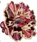  ??  ?? PRIMA DONNA The vivid red hues of rubies, rhodolite garnets and red tourmaline­s are used in the Aria Passionata chapter, seen below in the ring, earrings and bracelet