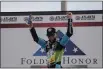  ?? BRYNN ANDERSON — ASSOCIATED PRESS ?? Kevin Harvick celebrates after winning the Monster Energy Cup Series race June 7at Atlanta Motor Speedway.