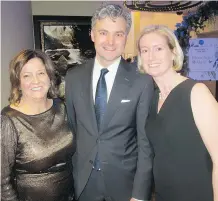  ??  ?? CUPS’ Carlene Donnelly with Parkland Fuel’s Darren Smart and Colbeck Strategic Advisors’ Margot Smart. The gala featured a performanc­e by Canadian sensation Shawn Hook.