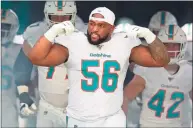  ?? John McCall / South Florida Sun Sentinel / TNS ?? Dolphins defensive tackle Davon Godchaux takes the field for a game against the Jets at Hard Rock Stadium on Nov. 3, 2019. Godchaux is the latest addition to the Patriots’ defensive corps.