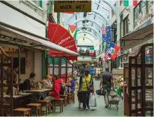  ??  ?? Brixton Market which is home to vibrant restaurant­s