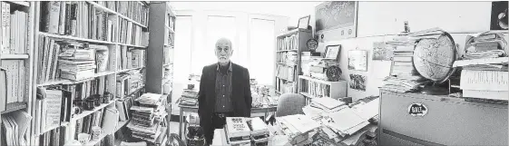  ?? BARRY GRAY THE HAMILTON SPECTATOR ?? John Colarusso is surrounded by 40 years of books and papers in his tiny McMaster University office.