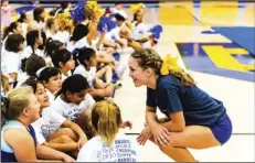  ?? PHOTO VINCENT OSUNA ?? Brawley Union High competitiv­e cheerleade­r Madison Hale speaks to youths during the 2019 Future Wildcat Cheer Camp on Saturday at BUHS in Brawley.