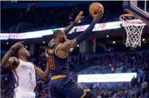  ?? Reuters ?? Cleveland Cavaliers’ LeBron James (23) drives to the basket in front of Oklahoma City Thunder’s Jerami Grant (9). —