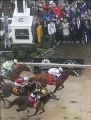  ?? NICK WASS — THE ASSOCIATED PRESS ?? Justify with Mike Smith atop wins the 143rd Preakness Stakes horse race at Pimlico race track, Saturday in Baltimore. Bravazo with Luis Saez aboard (8) wins second with Tenfold with Ricardo Santana Jr. atop (6) places.