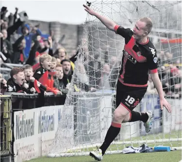  ??  ?? Brace bagged: Jordan Owens celebrates his second goal and is confident Crusaders can win title