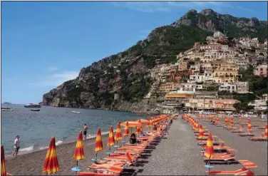  ?? (Rick Steves) ?? Positano, the jewel of Italy’s Amalfi Coast, hugs the rugged shoreline.