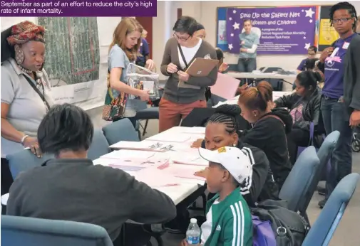  ??  ?? Henry Ford Health System’s Sew Up the Safety Net program held a resource fair at a Detroit church in September as part of an effort to reduce the city’s high rate of infant mortality.