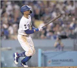  ?? KYUSUNG GONG — THE ASSOCIATED PRESS ?? The Dodgers’ Mookie Betts watches his three-run home run during the fifth inning.