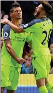  ??  ?? REDEMPTION: Lovren (left) marks his goal with Adam Lallana