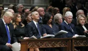  ?? ALEX BRANDON — THE ASSOCIATED PRESS ?? From left, President Donald Trump, first lady Melania Trump, former President Barack Obama, Michelle Obama, former President Bill Clinton and former Secretary of State Hillary Clinton listen during a State Funeral at the National Cathedral, Wednesday in Washington, for former President George H.W. Bush.