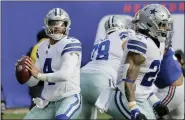  ?? AP PHOTO/COREY SIPKIN ?? Dallas Cowboys quarterbac­k Dak Prescott (4) looks to pass against the New York Giants during the first quarter of Sunday’s game in East Rutherford, N.J.