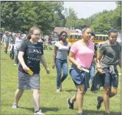  ?? STAFF PHOTOS BY JAMIE ANFENSON-COMEAU ?? Students at General Smallwood Middle School took part in a WalkA-Thon Friday to help raise money and support for the Charles County Relay for Life, a fundraiser for the American Cancer Society.