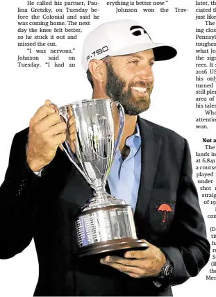  ?? —PHOTOS FROM AP ?? VERSATILE Dustin Johnson (top photo) hits a perfect approach to the 18th hole on Sunday to seal his first win in 490 days. The champion beams in displaying the championsh­ip trophy.