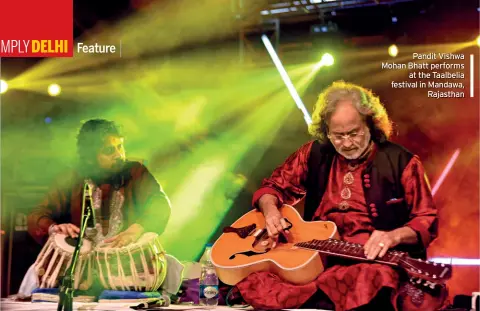  ??  ?? Pandit Vishwa Mohan Bhatt performs at the Taalbelia festival in Mandawa, Rajasthan