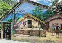  ?? MA ZHIPING / CHINA DAILY ?? A house wall painted to attract tourists in Sanpai village of Changjiang, Hainan province.