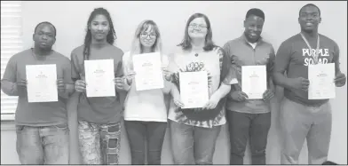  ??  ?? Eleventh grade: Junction City High School students who maintained a 3.5 GPA received National Honor Society certificat­es at a school board meeting. They are, from left, Trey Minor, Miguel Estrella, Tanner Summervill­e, Rylee Osgood, Geormar Owens and Terrell Gibson.