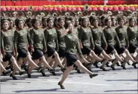  ?? AP PHOTO/KIN CHEUNG ?? North Korean soldiers march during a parade for the 70th anniversar­y of North Korea’s founding day in Pyongyang, North Korea, Sunday.