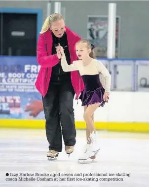  ??  ?? Izzy Harlow Brooke aged seven and profession­al ice-skating coach Michelle Cosham at her first ice-skating competitio­n