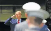  ?? AP PHOTO/ALEX BRANDON ?? President Donald Trump salutes after speaking to more than 1,110 cadets in the class of 2020 at a commenceme­nt ceremony Saturday on the parade field at the United States Military Academy in West Point, N.Y.