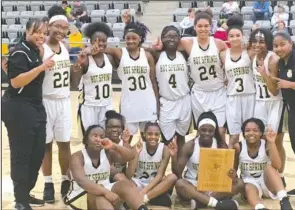  ?? Subitted photo ?? DISTRICT CHAMPS: The Hot Springs junior Lady Trojans defeated Lakeside 31-16 in the championsh­ip game of the 5A-South junior high girls’ district tournament Thursday in De Queen. Team members, from left, in front are India Hudson, Ivy Scott, Tamia Dolls, Jaylia Reed, and Nadiya Valrie, and back, from left, head coach Keysha Hill, Alix Frazier, Tylecia Easter, Jaeonna West, Ashanti Brown, Jurnee Hicks, Amiya Campbell, Darnesa Hudson and assistant coach Nicole Lowe.