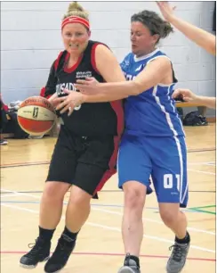  ?? ?? Lisa Martin, of Crusaders, drives to the hoop against Thanet Lions, and right, team-mate Danielle Muckian comes under pressure from Nicola Court