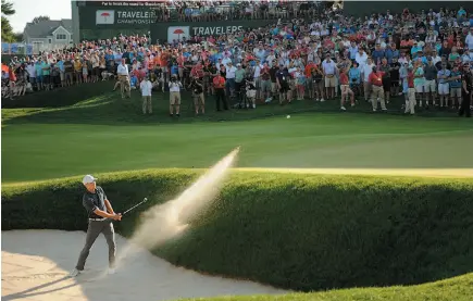  ?? AP PHOTO ?? Jordan Spieth holed his bunker shot on the 18th green for a birdie and win over Daniel Berger during the final round of the 2017 Travelers Championsh­ip golf tournament Sunday in Cromwell, Conn.