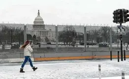  ?? Manuel Balce Ceneta / Associated Press ?? U.S. Capitol Police officials told congressio­nal leaders that the fence should stay in place for several more months as law enforcemen­t continues to track threats.