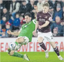  ?? ?? Finlay Pollock battles Joe Newell inthe February Edinburgh derby