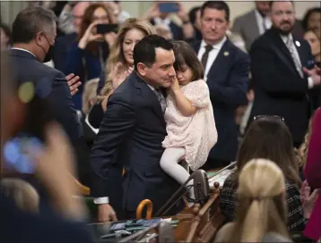  ?? JOSÉ LUIS VILLEGAS — THE ASSOCIATED PRESS ?? Assemblyma­n Anthony Rendon walks with his daughter Vienna before being sworn in as speaker of the Assembly during the opening session of the California Legislatur­e in Sacramento on Dec. 5, 2022.