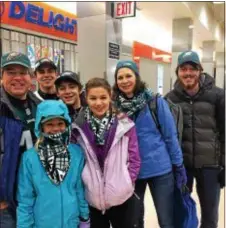  ??  ?? The Miller family of Yardley, PA., and friend Ryan (right) expected fun as they boarded a SEPTA 5:25 a.m. train to the Eagles championsh­ip parade.