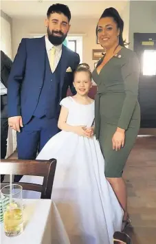  ??  ?? Proud moment Jessica with partner Darren and Mia on the day of the youngster’s Communion