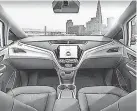  ?? GENERAL MOTORS ?? The interior of GM’s self-driving taxi, the GM Cruise. GM expects to begin mass-producing the Cruise in 2019.