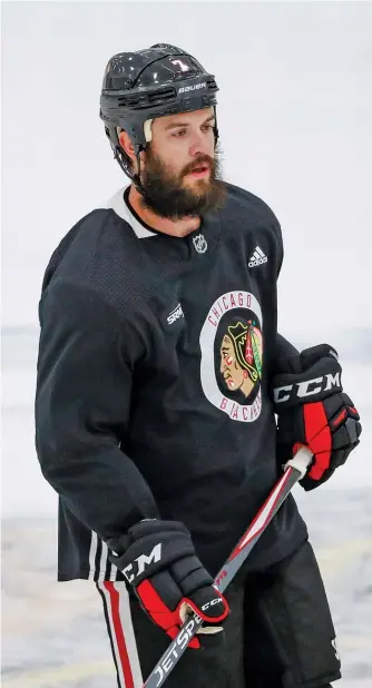  ?? KAMIL KRZACZYNSK­I/AP ?? Brent Seabrook, 35, told the Blackhawks that he will not participat­e in the playoffs. “I’m not going,” Seabrook said. “I just don’t feel comfortabl­e yet, as comfortabl­e as I want to feel on the ice.”