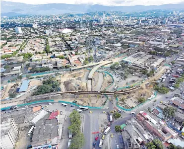  ??  ?? ESTE ES EL ASPECTO de la megaobra del intercambi­ador de la glorieta del Indio, donde se observa que la estructura metálica del puente de la carrera octava ya está conectado en su totalidad y se aprecia el avance de los otros dos pasos elevados que despegan de la avenida séptima.