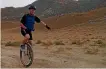  ??  ?? Bruce Hall rode his unicycle across the desert of Uzbekistan and Nepal’s Annapurna Circuit.