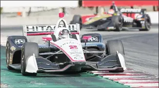  ??  ?? Josef Newgarden (2) races through Turn 11 during the IndyCar auto race at Laguna Seca Raceway in Monterrey,
California on Sept 22. (AP)