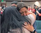  ?? ERIC GAY/AP ?? Veronica Mata, right, and other family members of victims of the shooting at Robb Elementary in Uvalde, Texas, react Monday in the capital Austin after a Texas House committee advanced a bill to raise the age for purchasing semiautoma­tic weapons.