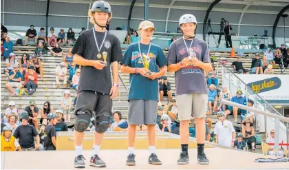  ?? ?? Cooper Steen (centre) winning the ASA New Zealand Scooter Nationals in January. He is pictured with Riley James, left, and Harry Payn, right.
