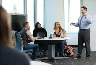  ?? SUPPLIED ?? Mount Royal University chemistry professor Brett McCollum, right, has earned a prestigiou­s Canadian teaching honour.