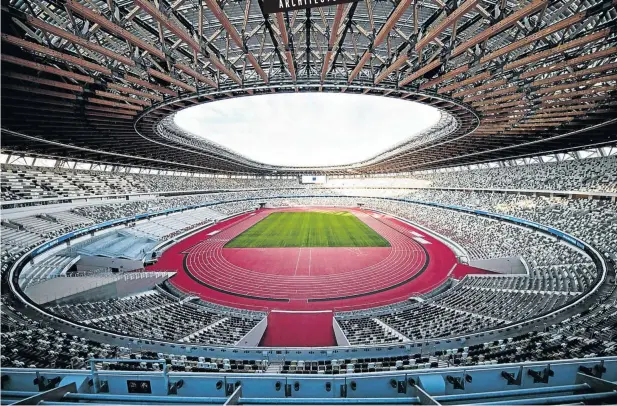  ?? Pictures: Akio Kon/Bloomberg via Getty Images & AP ?? Japan’s new National Stadium, designed by Kengo Kuma, below.