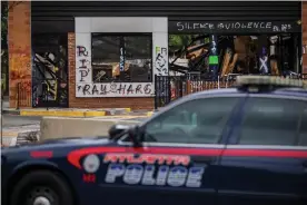  ?? Photograph: Erik S Lesser/EPA ?? Eight-year-old Secoriea Turner was killed over the violent Fourth of July holiday weekend near the site where Rayshard Brooks was killed on 12 June in Atlanta.