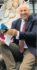  ??  ?? IT Sligo president Dr Brendan McCormack with a copy of the applicatio­n for IT Sligo to join a technologi­cal university at the college last week.