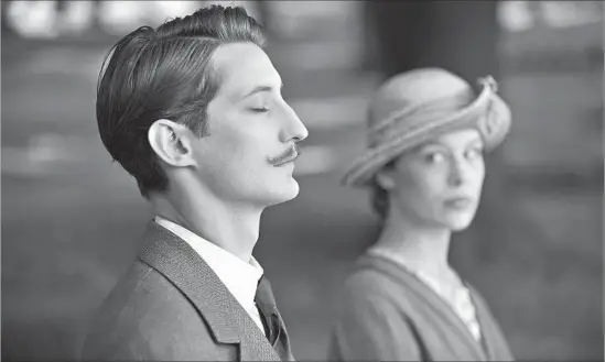  ?? Jean-Claude Moireau Foz / Music Box Films ?? WHY Adrien (Pierre Niney), a guilt-ridden French veteran, visits her fiancé’s grave is a mystery to Anna (Paula Beer) in this post-World War I tale of shared grief.