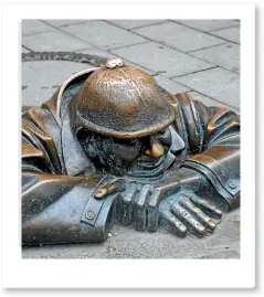  ??  ?? The Old Town in Bratislava is full of quirky street art like "The Peeper" a bronze statue who peeps from a manhole.