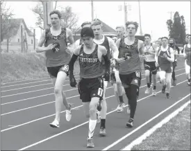  ?? Alex Eller ?? Noah Osmond (left) and Jesse Gallian (right) of Broken Bow compete during the Broken Bow Invite back on April 9. Osmond medaled in both the 3,200 meter run and the 1,600 meter run and Gallian was 10th in the 800 meter dash at the Marsh Beck Invitation­al.