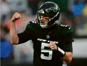  ?? ADAM HUNGER/ASSOCIATED PRESS ?? Mike White had New York humming with 315 passing yards and three TDs while replacing Zach Wilson as the Jets’ starter.