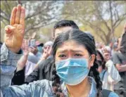  ??  ?? A woman cries during the burial in Mandalay of slain anti-coup protester Kyal Sin who died after being shot in the head at a rally.ap