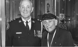  ??  ?? Toronto’s Chief Bill Blair and Peter C. Newman.