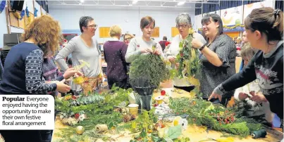  ??  ?? Popular Everyone enjoyed having the opportunit­y to make their own festive floral arrangemen­t